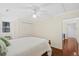Comfortable bedroom featuring hardwood floors, a ceiling fan, and ample storage space with double closets at 2369 Rice Pond Rd, Charleston, SC 29414