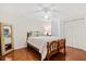 Charming bedroom with hardwood floors, a decorative mirror, and a comfy bed near double closets at 2369 Rice Pond Rd, Charleston, SC 29414