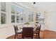 Breakfast nook with white cabinetry, and sun-drenched windows with plantation shutters at 2369 Rice Pond Rd, Charleston, SC 29414
