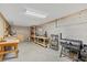 Spacious garage features concrete walls and shelving perfect for workshop or storage space at 2369 Rice Pond Rd, Charleston, SC 29414