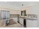 Kitchen features stainless steel appliances, granite countertops, and built-in beverage cooler at 2369 Rice Pond Rd, Charleston, SC 29414