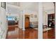 Elegant living room featuring hardwood floors, a formal sitting area, and an open floor plan at 2369 Rice Pond Rd, Charleston, SC 29414