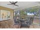 Relax and dine al fresco on the screened porch, offering views of the surrounding landscape at 2369 Rice Pond Rd, Charleston, SC 29414