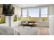Light filled bedroom with beautiful views of the marsh at 2618 Raven Dr, Sullivans Island, SC 29482