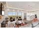 Bright living room showcasing marsh views, an open layout to the kitchen, and comfortable seating for relaxation at 2618 Raven Dr, Sullivans Island, SC 29482