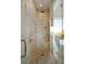 Tiled walk-in shower boasting a rain shower head and seamless glass enclosure at 2618 Raven Dr, Sullivans Island, SC 29482