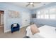 Calm bedroom featuring a bed, carpet, blue chair, closet doors, and a window at 2632 Alderly Ln, Mount Pleasant, SC 29466