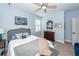 Comfortable bedroom with light blue walls and carpet featuring a bed and decor at 2632 Alderly Ln, Mount Pleasant, SC 29466