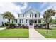 Inviting two-story home with porch, manicured landscaping, and walkway at 2632 Alderly Ln, Mount Pleasant, SC 29466