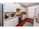 Well-lit kitchen featuring stainless steel appliances, ample counter space, and white cabinetry at 2632 Alderly Ln, Mount Pleasant, SC 29466