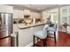 Bright kitchen featuring stainless steel appliances, granite countertops, and convenient bar seating at 2632 Alderly Ln, Mount Pleasant, SC 29466