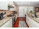Spacious kitchen with stainless steel appliances, granite counters, and access to outdoor space at 2632 Alderly Ln, Mount Pleasant, SC 29466