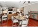 Open living area combines kitchen and living spaces, with hardwood floors and access to dining and living rooms at 2632 Alderly Ln, Mount Pleasant, SC 29466