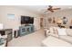 Living room featuring sofa, tv, and painted blue console at 2632 Alderly Ln, Mount Pleasant, SC 29466