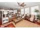 Spacious living room features hardwood floors, ceiling fan, and comfortable seating, perfect for relaxing or entertaining guests at 2632 Alderly Ln, Mount Pleasant, SC 29466