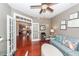 Inviting office with hardwood floors, comfortable sofa, and elegant decor, ideal for work or relaxation at 2632 Alderly Ln, Mount Pleasant, SC 29466