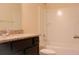 Bathroom with a vanity, tub and shower combination, and a white toilet at 303 Citation Way, Moncks Corner, SC 29461