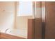 Clean, bright bathroom with tub, tiled walls, and a glass door shower at 303 Citation Way, Moncks Corner, SC 29461
