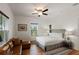 Inviting bedroom with a queen size bed, windows and stylish furniture at 31 W 9Th St, Folly Beach, SC 29439
