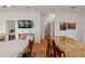 Bright, open kitchen showcasing a breakfast bar and views through the home to the bedroom and bathroom at 31 W 9Th St, Folly Beach, SC 29439