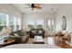 Airy living area with large windows and cozy furniture near the Primary bedroom at 31 W 9Th St, Folly Beach, SC 29439