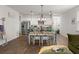 Dining room features stylish lighting and is adjacent to the kitchen at 315 Black Birch Dr, Summerville, SC 29486