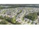 Aerial view of the community featuring ponds, mature trees, and well-maintained homes at 341 Drayton Place Drive Dr, Moncks Corner, SC 29461