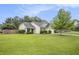 Home featuring a well-manicured front lawn at 341 Drayton Place Drive Dr, Moncks Corner, SC 29461