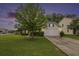 Charming home with a well-manicured lawn and a two-car garage at 341 Drayton Place Drive Dr, Moncks Corner, SC 29461