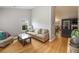 Inviting living room features hardwood floors and natural light at 341 Drayton Place Drive Dr, Moncks Corner, SC 29461