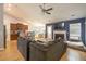 Spacious living room featuring hardwood floors, a fireplace, and open kitchen at 341 Drayton Place Drive Dr, Moncks Corner, SC 29461