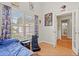 Bright bedroom featuring natural light, light wood floors, and whimsical decor at 3486 Ashwycke St, Mount Pleasant, SC 29466