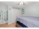 Comfortable bedroom featuring neutral tones, minimalist decor, and a double door closet at 3486 Ashwycke St, Mount Pleasant, SC 29466