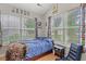 Bright bedroom featuring natural light, light wood floors, and playful decor at 3486 Ashwycke St, Mount Pleasant, SC 29466