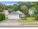 Charming single Gathering home features a two-car garage and well maintained landscaping at 3486 Ashwycke St, Mount Pleasant, SC 29466