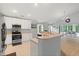 Bright kitchen featuring white cabinets, stainless steel appliances, and tile flooring at 3486 Ashwycke St, Mount Pleasant, SC 29466