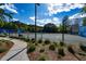 Community tennis courts with a paved walking path and lush landscaping for recreation at 3486 Ashwycke St, Mount Pleasant, SC 29466