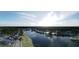 Overhead view featuring serene community with pond, waterfront homes and lush green space at 3901 Summerton St, Mount Pleasant, SC 29466