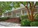 Beautiful clubhouse with brick stairs, landscaping, and an expansive porch at 417 Verbena Ave, Summerville, SC 29483