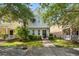 Charming home featuring lush landscaping and a welcoming entryway at 417 Verbena Ave, Summerville, SC 29483