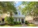 Charming home featuring lush landscaping and a welcoming entryway at 417 Verbena Ave, Summerville, SC 29483