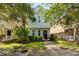 Charming home featuring lush landscaping, a welcoming entryway at 417 Verbena Ave, Summerville, SC 29483