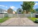 Property with spacious, private rear parking and white picket fence at 417 Verbena Ave, Summerville, SC 29483