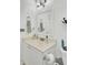 A partial view of a bathroom with a vanity, toilet, and wall decorations at 4209 Wildwood Lndg, Charleston, SC 29420