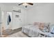 Cozy bedroom with a rug, fan, closet, and attached bathroom entrance at 4209 Wildwood Lndg, Charleston, SC 29420