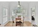 Bright dining area with large windows and comfortable seating at 4209 Wildwood Lndg, Charleston, SC 29420