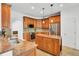 Well-equipped kitchen featuring granite countertops, wood cabinetry, and stainless-steel appliances at 4209 Wildwood Lndg, Charleston, SC 29420