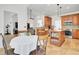 Open kitchen design with granite island, pendant lights, and adjacent living spaces at 4209 Wildwood Lndg, Charleston, SC 29420