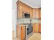 Elegant kitchen showcasing wood cabinetry, granite countertops, and stainless-steel appliances at 4209 Wildwood Lndg, Charleston, SC 29420