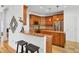 Cozy kitchen with a breakfast bar, ample cabinetry, and stainless-steel appliances at 4209 Wildwood Lndg, Charleston, SC 29420